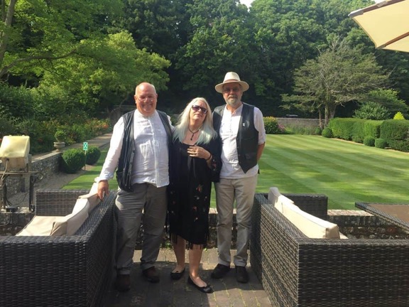 Alan, Rhiannon and Martin at a wedding